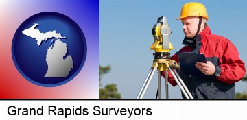 a surveyor with transit level equipment in Grand Rapids, MI