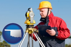 oklahoma map icon and a surveyor with transit level equipment