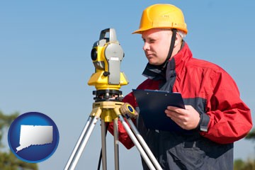 a surveyor with transit level equipment - with Connecticut icon