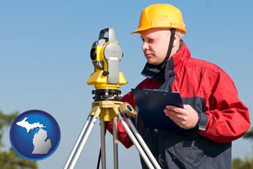 a surveyor with transit level equipment - with Michigan icon