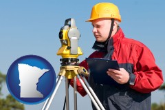 Minnesota - a surveyor with transit level equipment