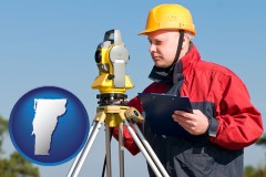 Vermont - a surveyor with transit level equipment